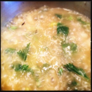Wilt the nettles into the broth mixture Wilt the nettles into the broth mixture