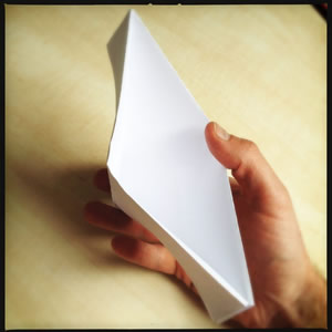 Insert thumbs and pull outwards Insert thumbs and pull outwards