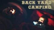 Back yard camping - fun with torches.